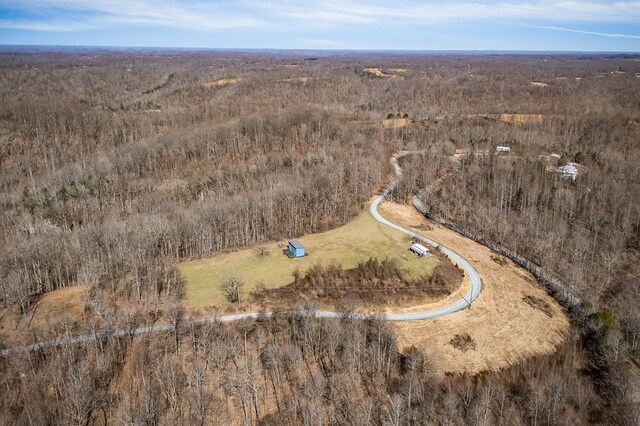 birds eye view of property featuring a rural view