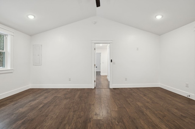 1069 Pleasant Shade Hwy, Pleasant Shade, TN 37145 - spare room featuring lofted ceiling, dark wood-style floors, electric panel, and recessed lighting