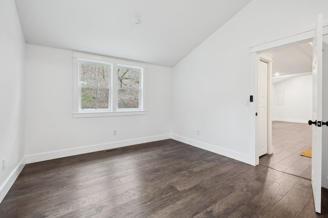 1069 Pleasant Shade Hwy, Pleasant Shade, TN 37145 - spare room featuring lofted ceiling and dark wood-type flooring