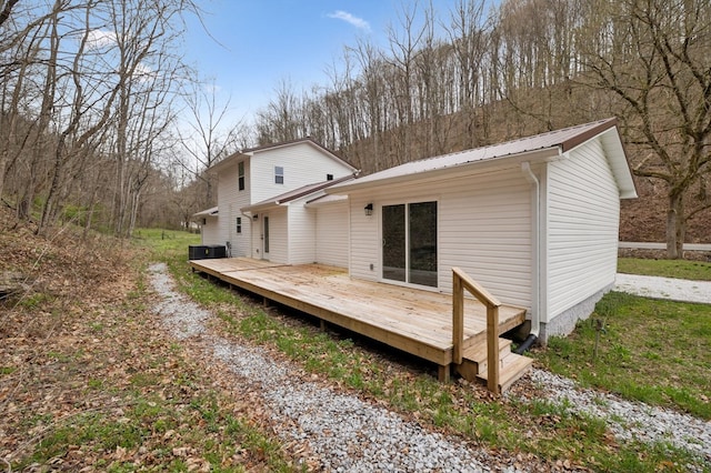1069 Pleasant Shade Hwy, Pleasant Shade, TN 37145 - rear view of house with a wooden deck and a metal roof