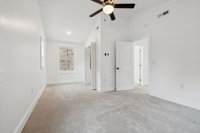 1069 Pleasant Shade Hwy, Pleasant Shade, TN 37145 - unfurnished bedroom featuring light carpet, high vaulted ceiling, a ceiling fan, and a closet