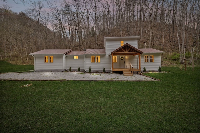 1069 Pleasant Shade Hwy, Pleasant Shade, TN 37145 - view of front of home featuring a front lawn and a metal roof