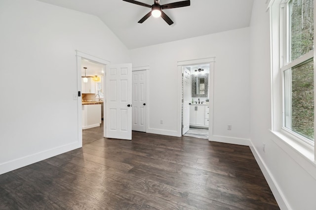 1069 Pleasant Shade Hwy, Pleasant Shade, TN 37145 - unfurnished bedroom featuring dark wood-style floors, lofted ceiling, connected bathroom, and a ceiling fan