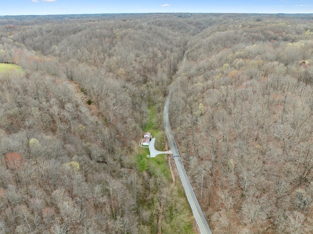 1069 Pleasant Shade Hwy, Pleasant Shade, TN 37145 - aerial view of property and surrounding area featuring a heavily wooded area