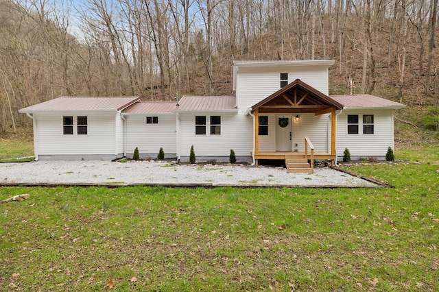 1069 Pleasant Shade Hwy, Pleasant Shade, TN 37145 - back of house with a yard and a metal roof
