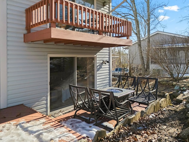 deck with an outdoor fire pit