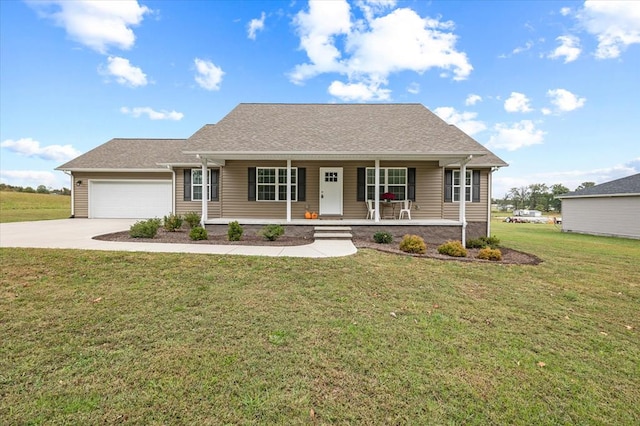 single story home featuring driveway, covered porch, an attached garage, and a front lawn