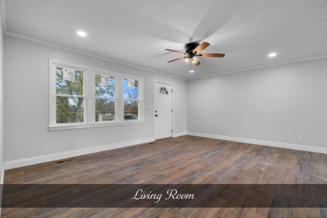 entryway featuring baseboards, ceiling fan, ornamental molding, dark wood-type flooring, and a textured ceiling