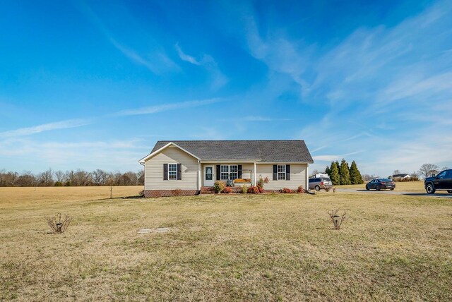 single story home featuring a porch and a front yard