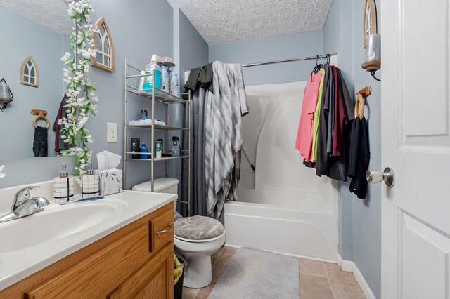 full bathroom featuring a textured ceiling, tile patterned flooring, toilet, vanity, and shower / tub combo with curtain