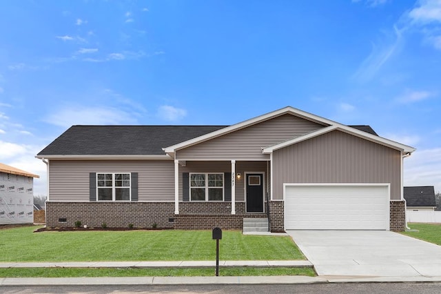 ranch-style house featuring a garage, driveway, brick siding, and a front lawn