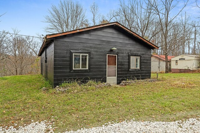 exterior space with a front yard