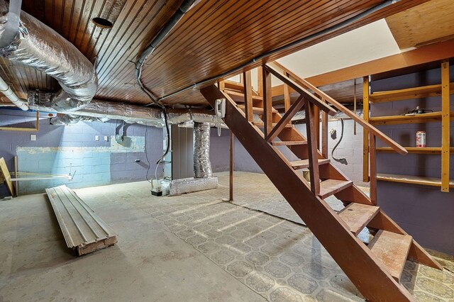 unfinished basement with stairway