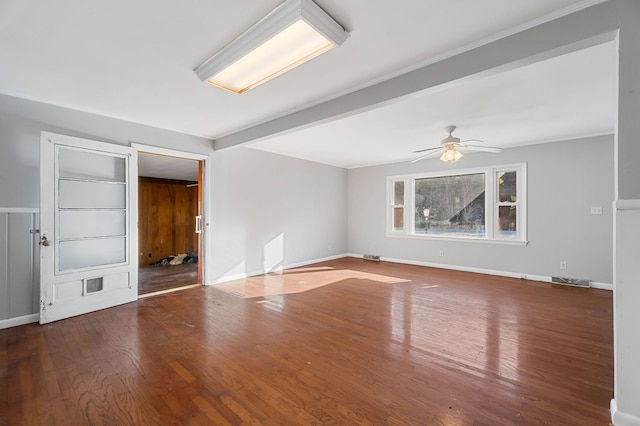 empty room with beam ceiling, baseboards, a ceiling fan, and wood-type flooring