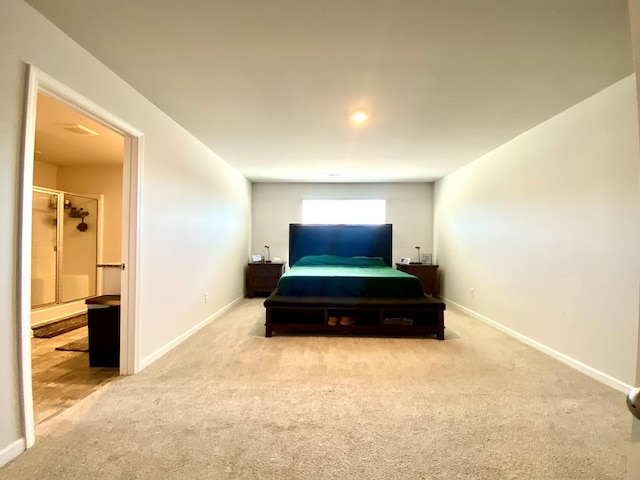 bedroom featuring carpet floors and baseboards