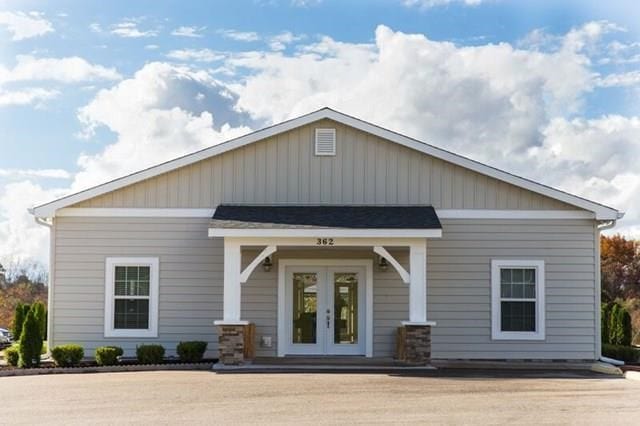 view of front facade featuring french doors