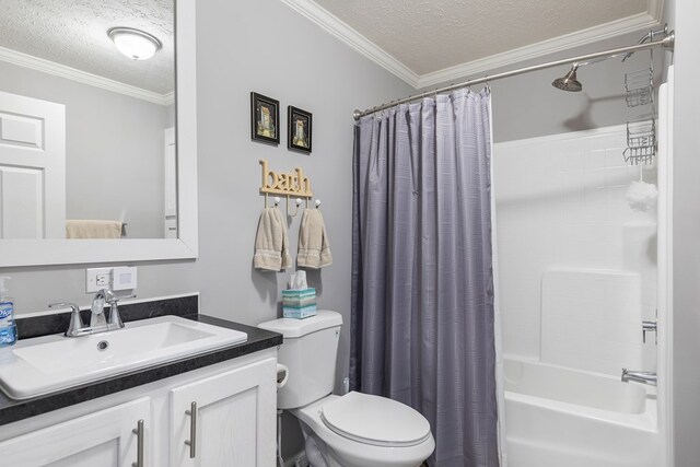 full bathroom featuring toilet, ornamental molding, vanity, and a textured ceiling