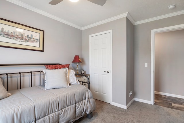 bedroom featuring carpet flooring, ceiling fan, crown molding, and baseboards