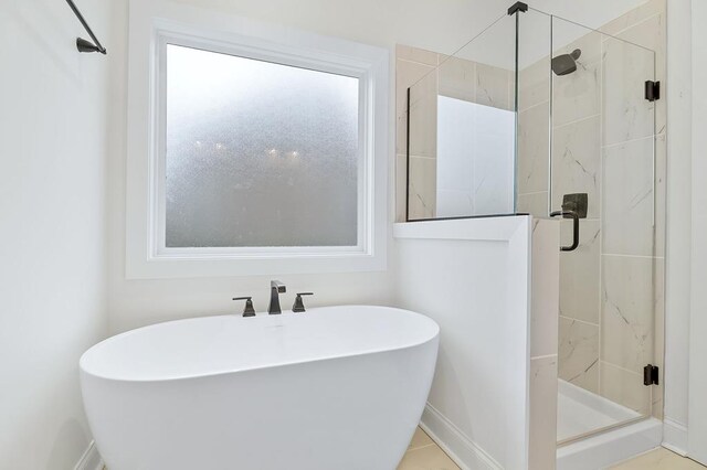 bedroom featuring multiple windows, a raised ceiling, and crown molding