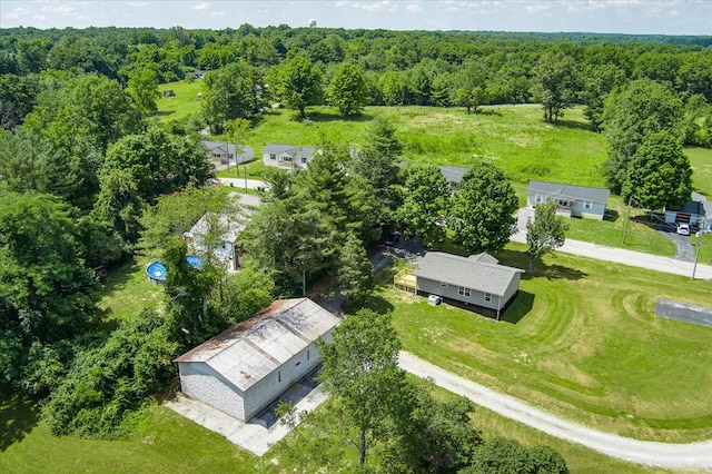 aerial view with a wooded view