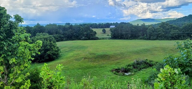 exterior space with a rural view