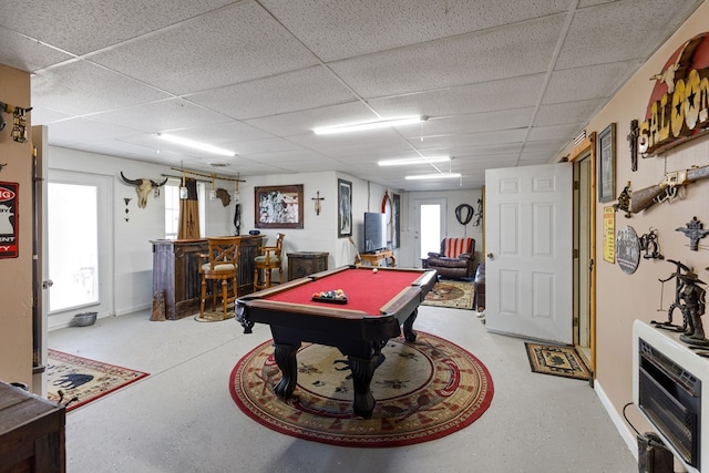 playroom featuring pool table, a bar, and a paneled ceiling