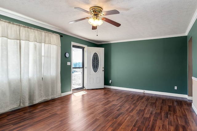 foyer entrance with a textured ceiling, wood finished floors, and crown molding