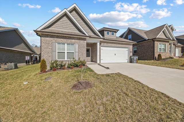 craftsman inspired home with driveway, an attached garage, cooling unit, a front lawn, and brick siding