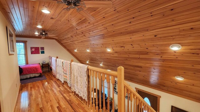 bedroom featuring light wood finished floors, recessed lighting, wooden ceiling, and vaulted ceiling