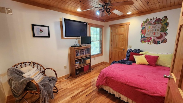 bedroom with recessed lighting, light wood-type flooring, baseboards, and wood ceiling