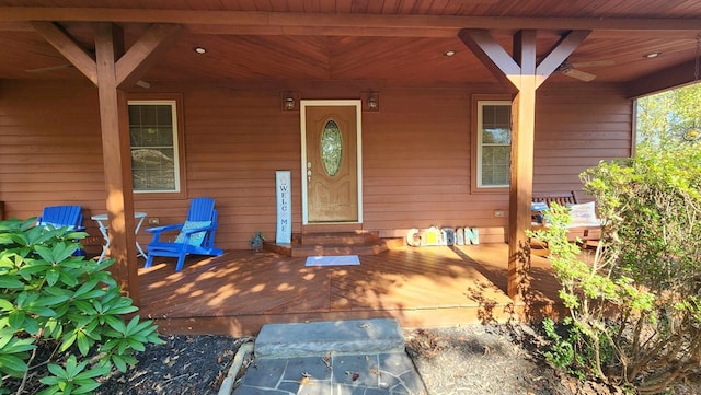 property entrance with covered porch