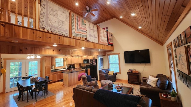 living area with ceiling fan, light wood-type flooring, recessed lighting, wooden ceiling, and high vaulted ceiling