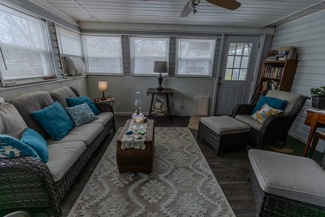 sunroom with a ceiling fan