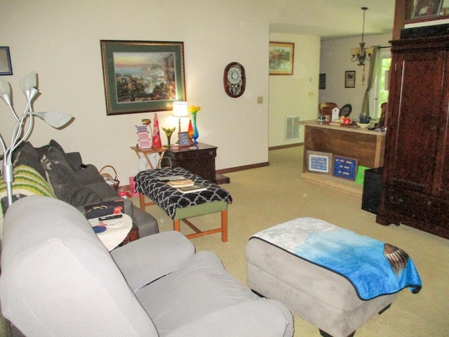 living area with light carpet, baseboards, and visible vents