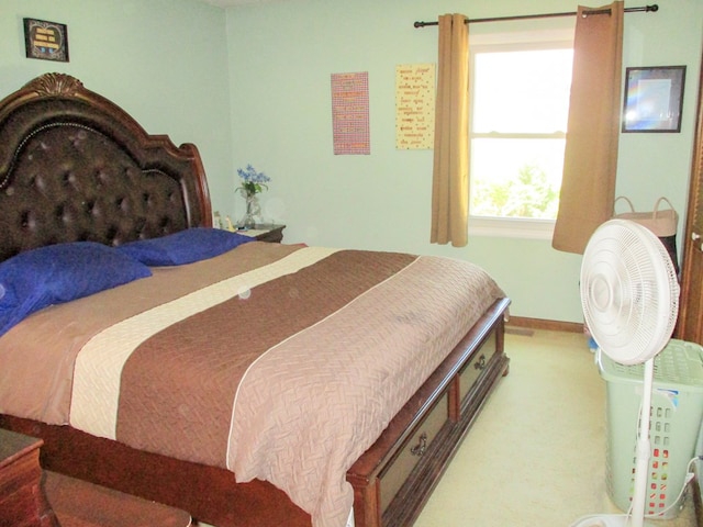 bedroom featuring baseboards