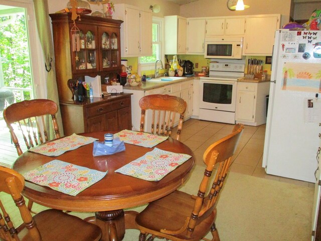 dining room with light tile patterned floors