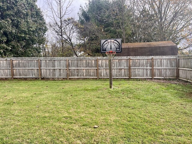 view of yard with fence