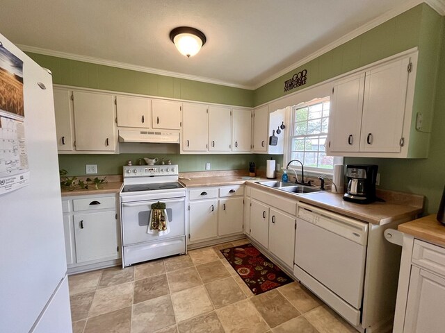 kitchen with white appliances, light countertops, under cabinet range hood, white cabinetry, and a sink