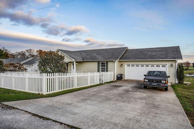 single story home featuring a fenced front yard, roof with shingles, driveway, and an attached garage