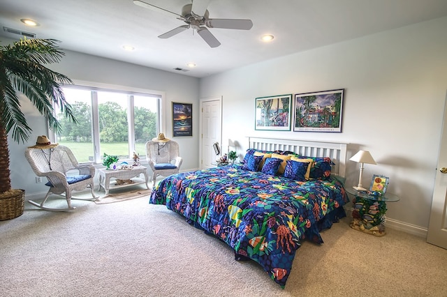 bedroom featuring carpet flooring, visible vents, and baseboards