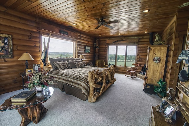 bedroom featuring carpet floors and wooden ceiling