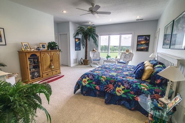 bedroom with light carpet, baseboards, visible vents, and recessed lighting