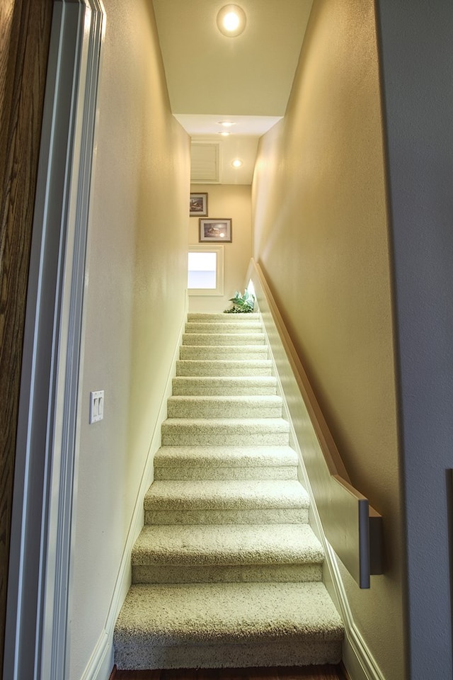 stairway with baseboards