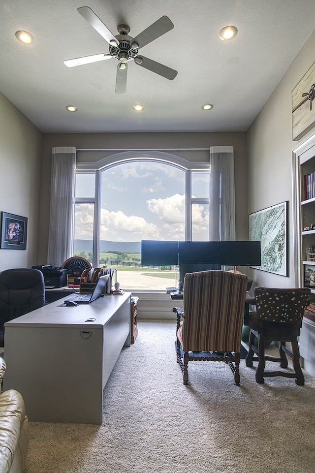 home office featuring recessed lighting, carpet flooring, and a healthy amount of sunlight