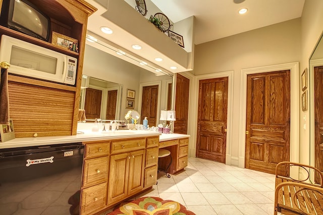 bathroom featuring tile patterned flooring, vanity, and recessed lighting