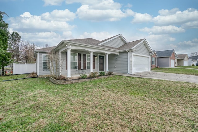 view of front of property featuring a garage, concrete driveway, covered porch, fence, and a front yard