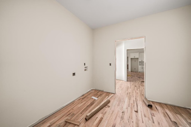 spare room with light wood-style flooring