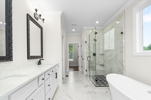 full bath featuring marble finish floor, crown molding, a wealth of natural light, and a sink