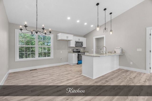 kitchen featuring stainless steel appliances, hanging light fixtures, light stone countertops, and white cabinets