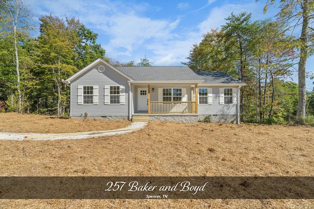 single story home featuring crawl space and covered porch